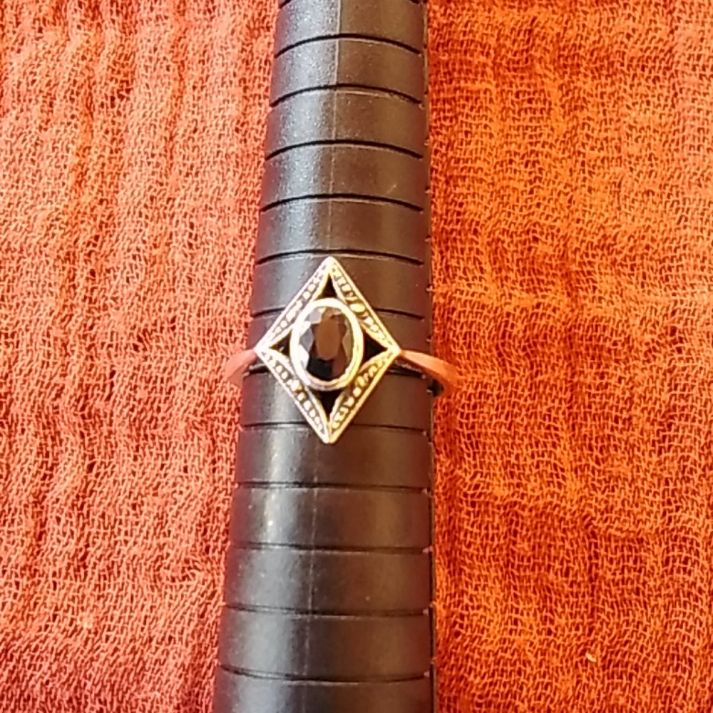 Silver and black amethyst ring.